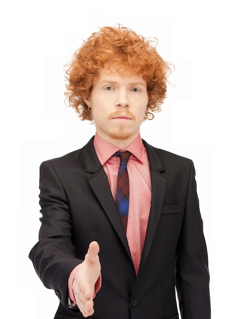 handsome man with an open hand ready for handshake