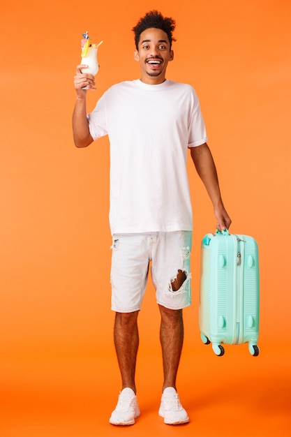 Handsome man with white T-shirt ready to travel