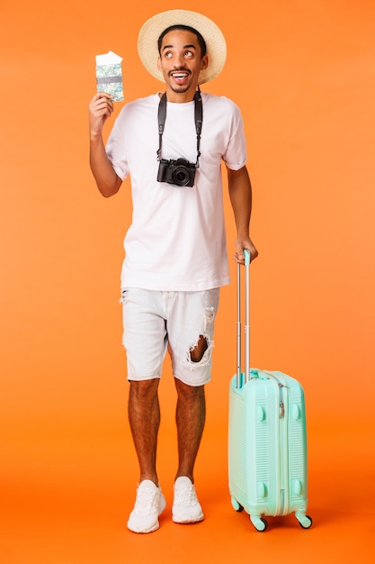 Handsome man with white T-shirt ready to travel