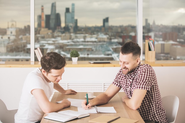 Handsome men doing paperwork side