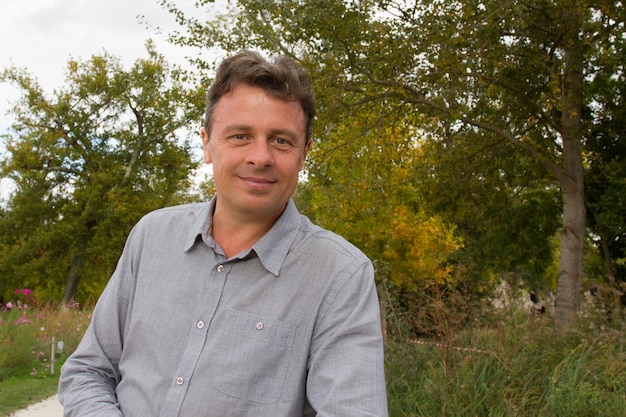 Handsome middle age man outdoor smiling