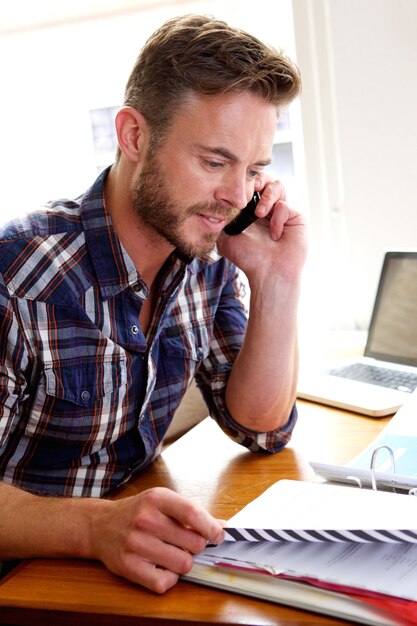 Handsome middle age man working at desk