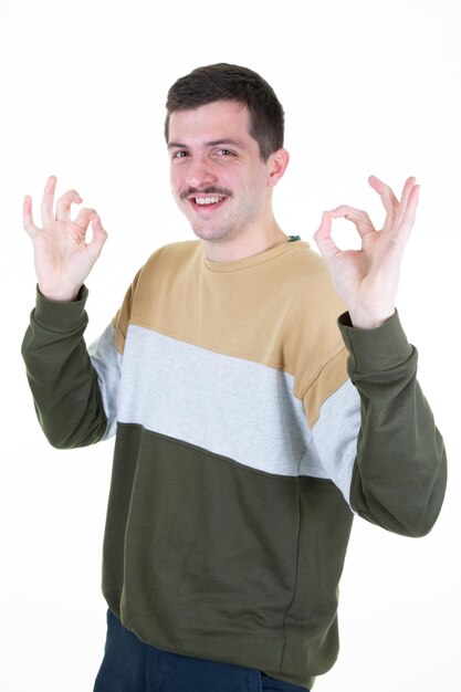 Photo handsome mustache  man smiling and showing ok fingers hand sign at camera isolated over white background