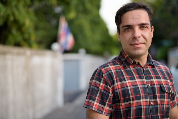 Handsome Persian man in the streets outdoors