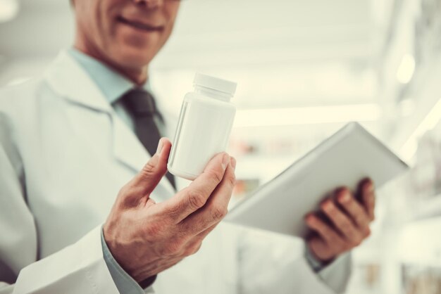 Handsome pharmacist working