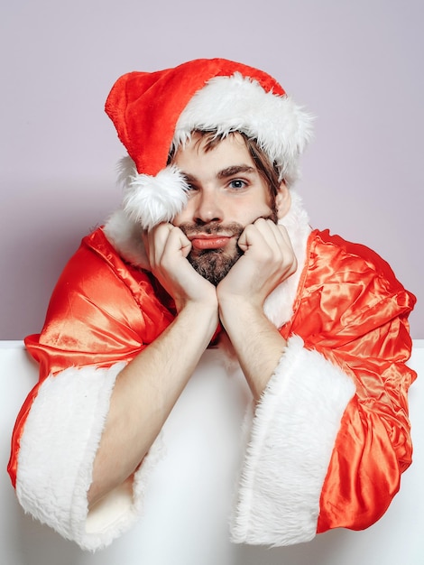 Handsome sad santa man