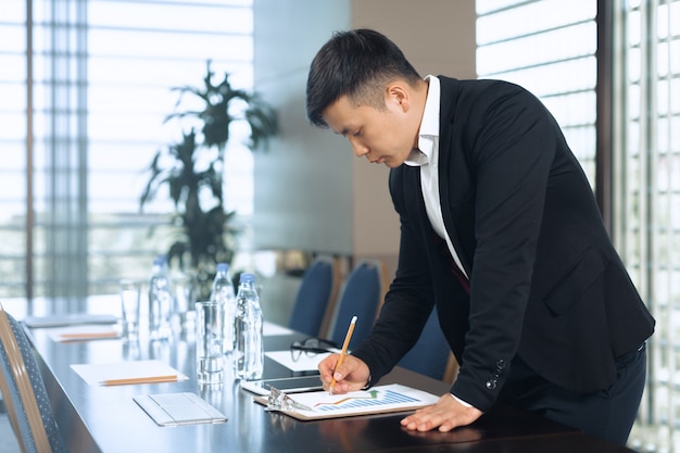 Handsome smiling confident businessman portrait