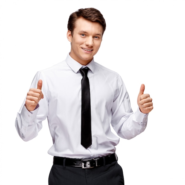 Handsome stylish businessman on white wall