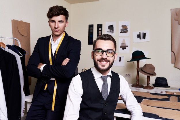 Handsome Tailors Posing in Atelier