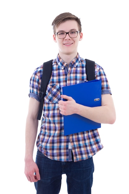 Handsome teenage boy with backpack and book isolated on white background