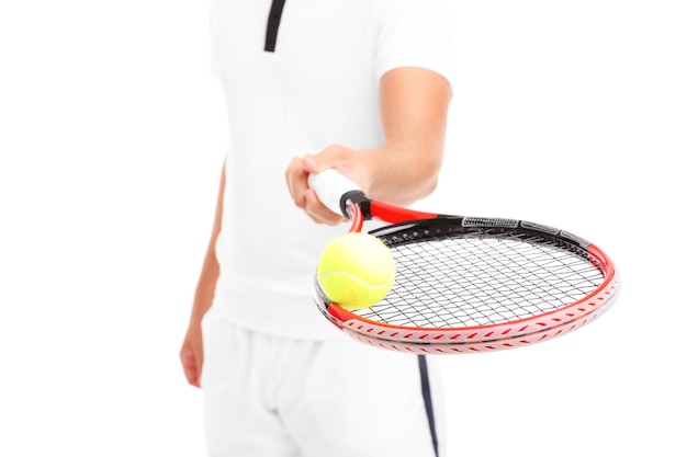 a handsome tennis player giving a racket over white background