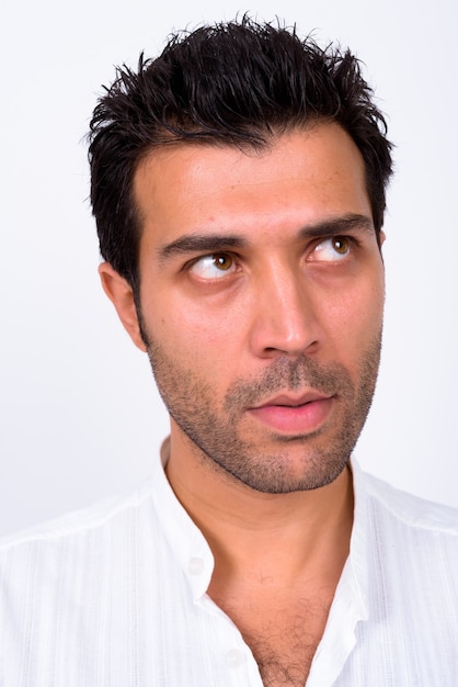  handsome Turkish man against white wall