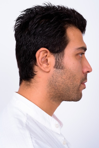  handsome Turkish man against white wall