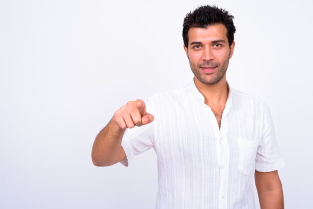  handsome Turkish man against white wall