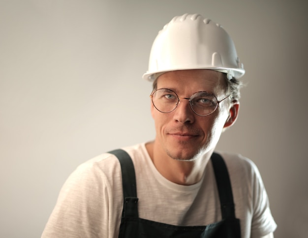 Handsome worker wearing a helmet