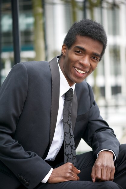 Handsome young african american businessman smiling