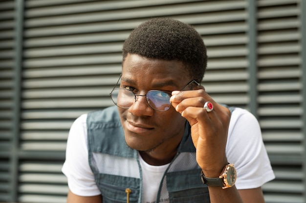 handsome young african male with glasses