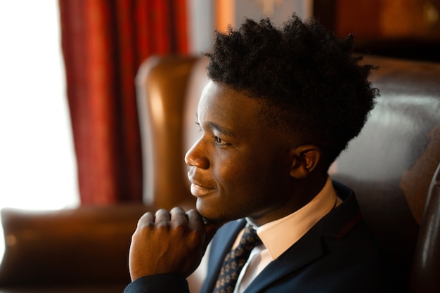 handsome young african man in suit