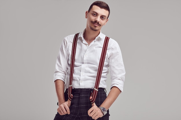 Photo handsome young arabic hipster with white shirt and suspenders