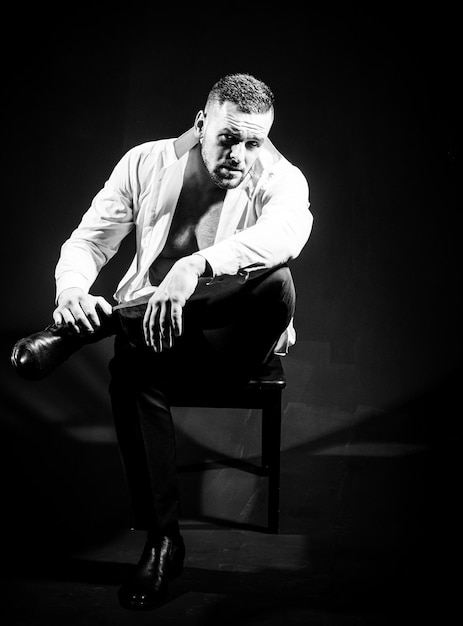 Handsome young business man in whit shirt