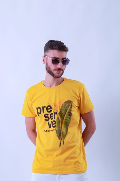 Handsome young guy posing in studio  isolated