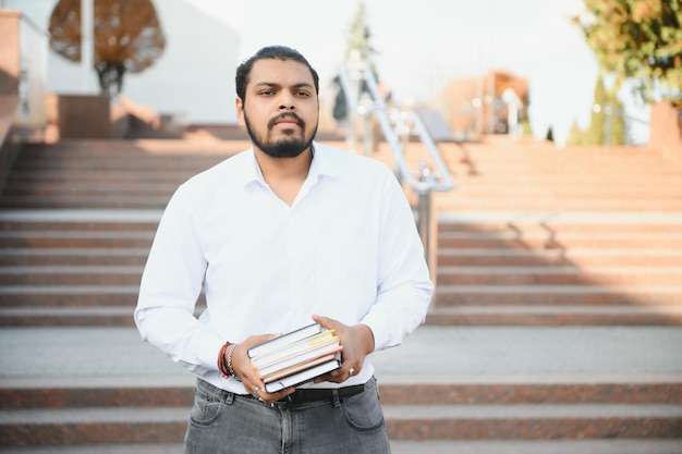 Handsome and young indian Male college student