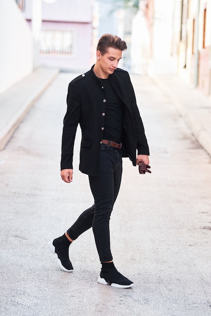 Handsome young man in black