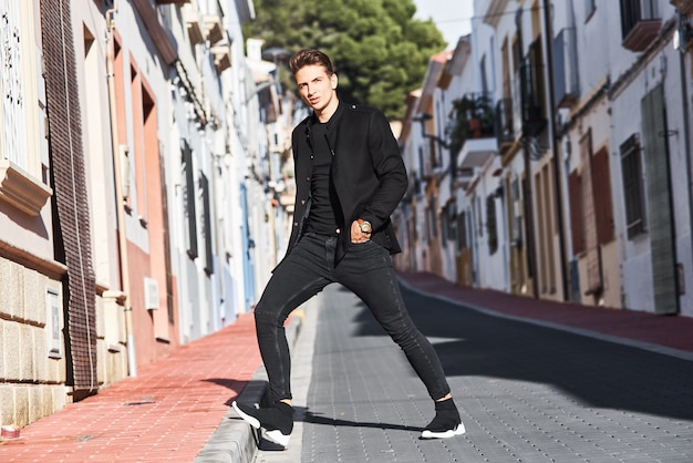 Handsome young man in black