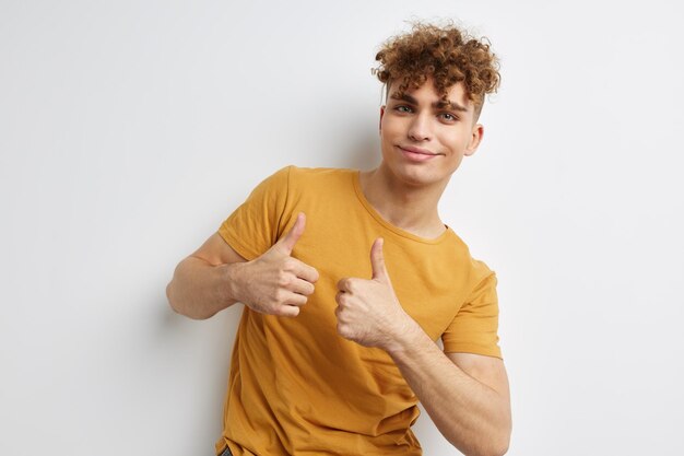 Photo handsome young man posing studio smile isolated background