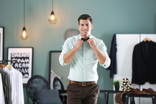 Photo handsome young man in shirt indoors