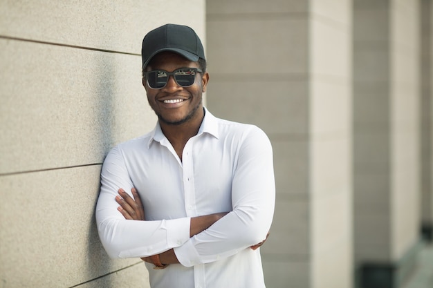 handsome young man in shirt and sunglasses