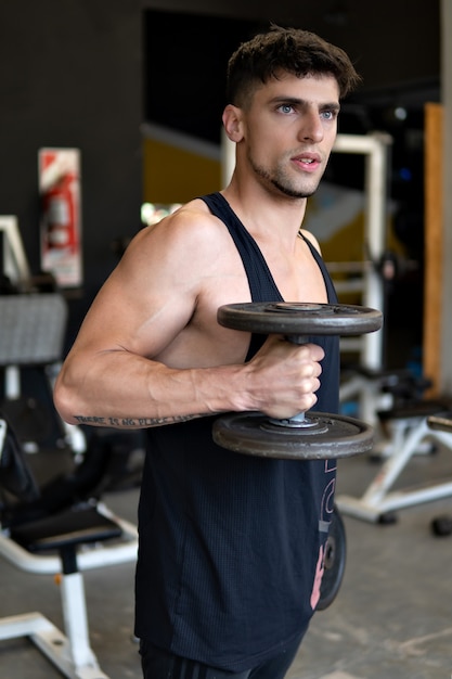 Handsome young man training looking into the distance