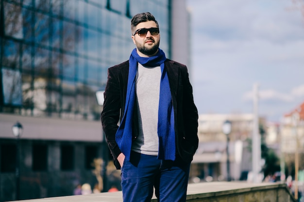 Handsome young man on a walk in town