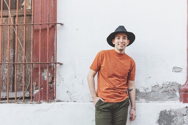 Handsome young man wearing hat Street portrait of young man