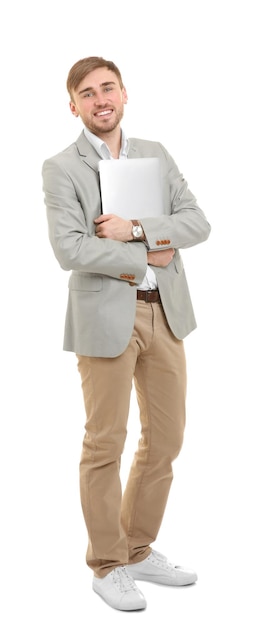 Handsome young man with laptop on white background