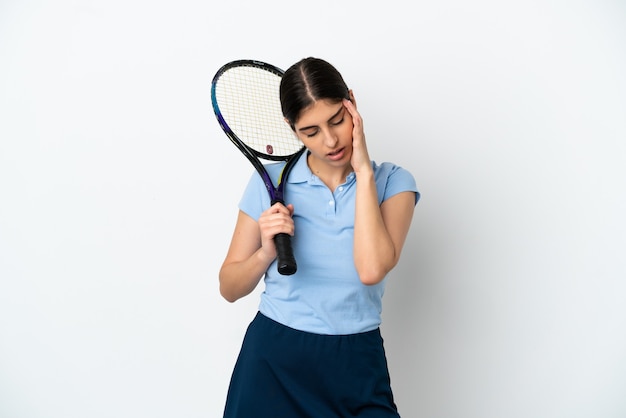 Handsome young tennis player caucasian woman isolated on white background with headache