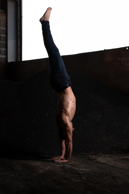 Handstand Pushup Man Workout at Warehouse