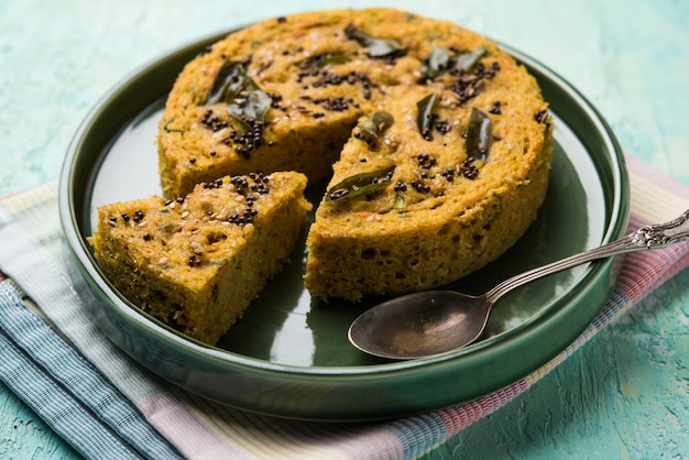 Handvo or handwa is a vegetable cake originating from the Gujarat, India. selective focus