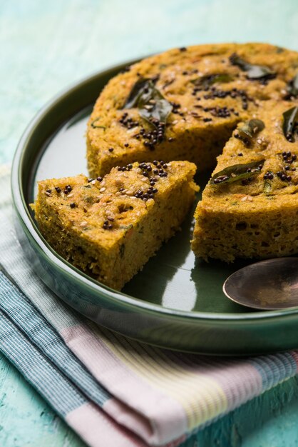 Handvo or handwa is a vegetable cake originating from the Gujarat, India. selective focus