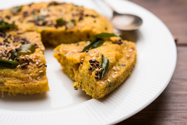 Handvo or handwa is a vegetable cake originating from the Gujarat, India. selective focus