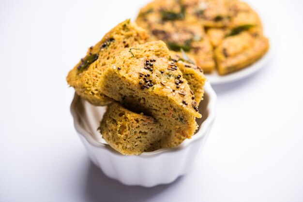 Handvo or handwa is a vegetable cake originating from the Gujarat, India. selective focus