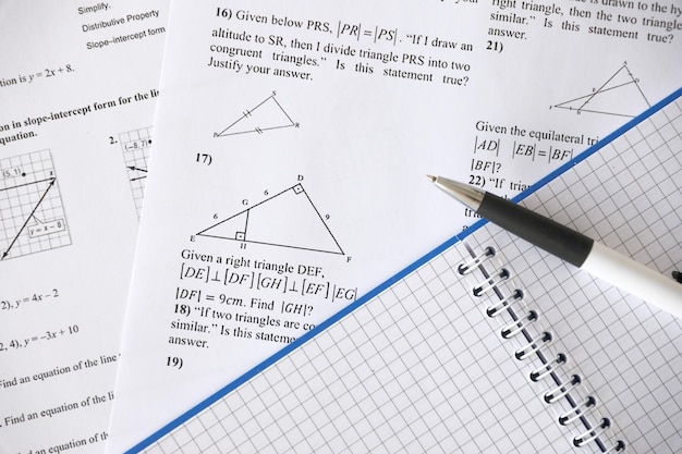 Handwriting of geometrical tasks on examination practice quiz or test in geometry class Solving exponential equations concept