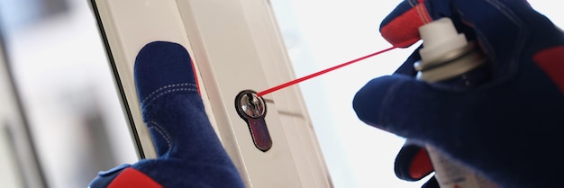 Handyman repair lock in front door or window worker with gloves and tools installing new lock