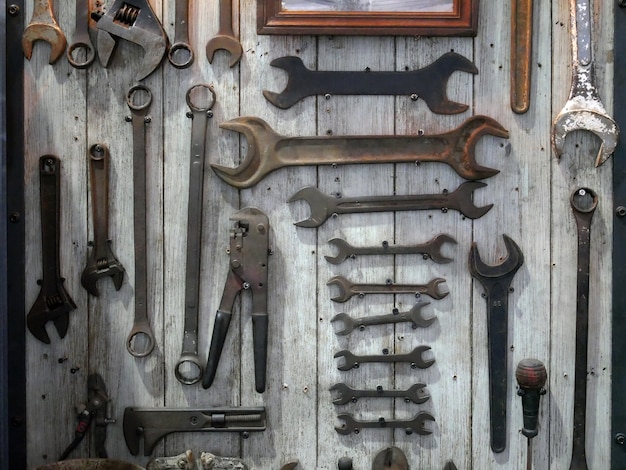 Handyman tools on wood background