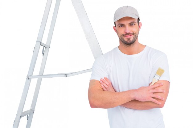 handyman with paintbrush and ladder 