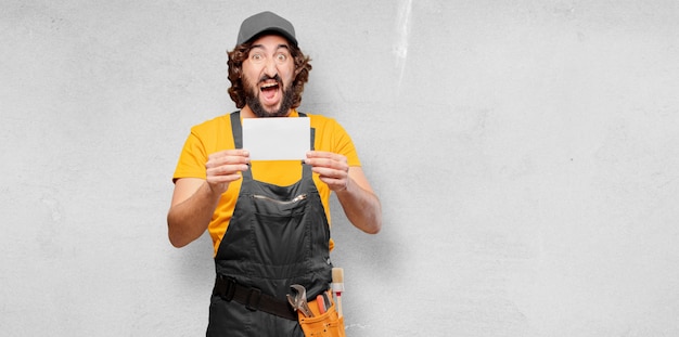 Handyman worker  with a placard