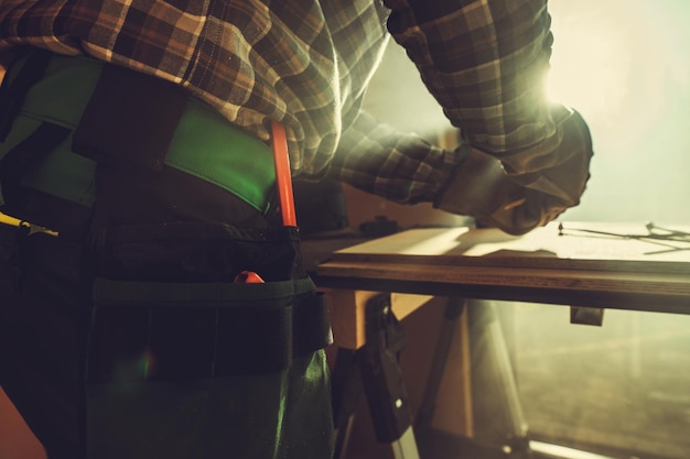 Handyman Working Inside His Small Workshop