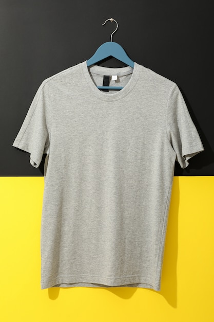 Hanger with blank gray t-shirt on two tone