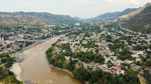 Hanging Bridge that Passes over a River Surrounded