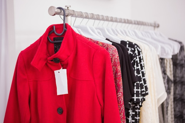 Hanging red coat at a boutique